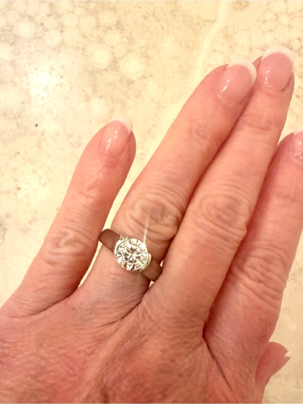 2 Carat Round Solitaire Moissanite, Set in Sterling Silver. Size 8.